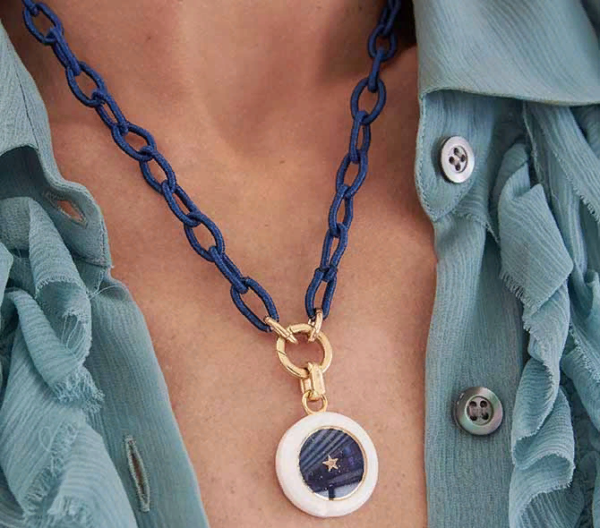Anna Maccieri Rossi Carpe Diem White Midnight Charm, made of ceramic, stainless steel, midnight aventurine glass and a gold star that turns.