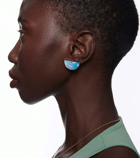 Anna Maccieri Rossi Ora Day Half an Hour earrings featuring hand painted clouds on a mother of pearl background, set with a diamond and set in 18k white and yellow gold.