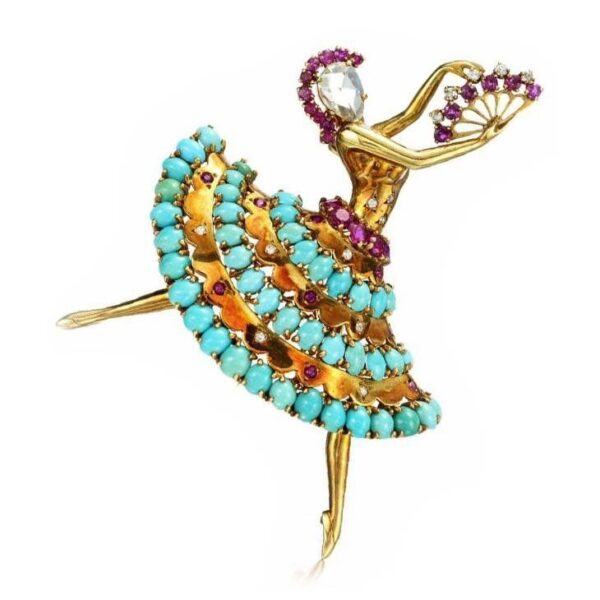 Ballerina brooch with turquoise and rubies.