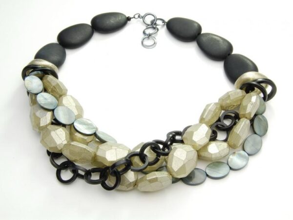 Black and white necklace with natural stones in three strands.