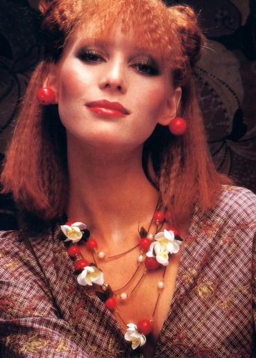 Bright red floral jewelry.