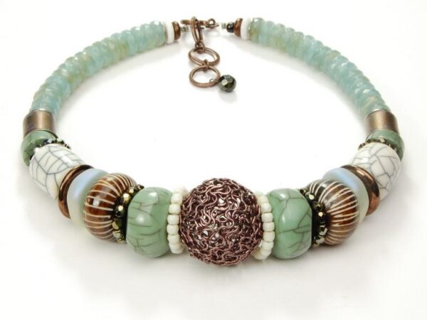 Choker with jade and golden ball.