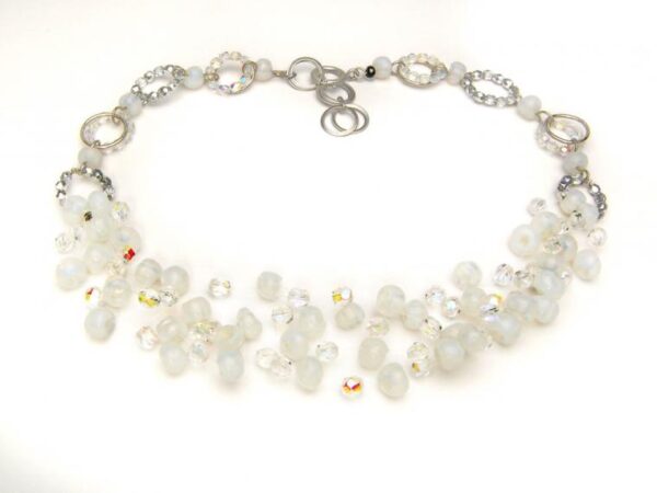 Delicate necklace with white beads.