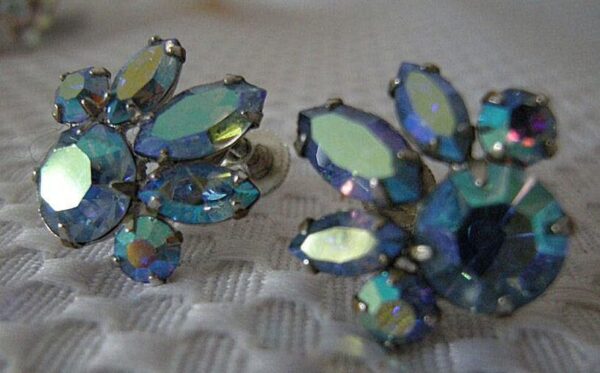 Earrings with blue iridescent crystals. Earrings with blue iridescent crystals.