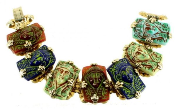 Egyptian style necklace with pharaoh faces.