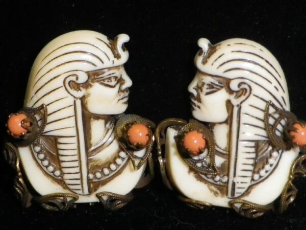 Enameled white earrings in Egyptian style.