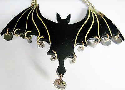 Gigantic British bat necklace, a sold out bestseller called the Batmosphere Necklace, specially made in 2011 to match Eley Kishimoto’s textile prints.
