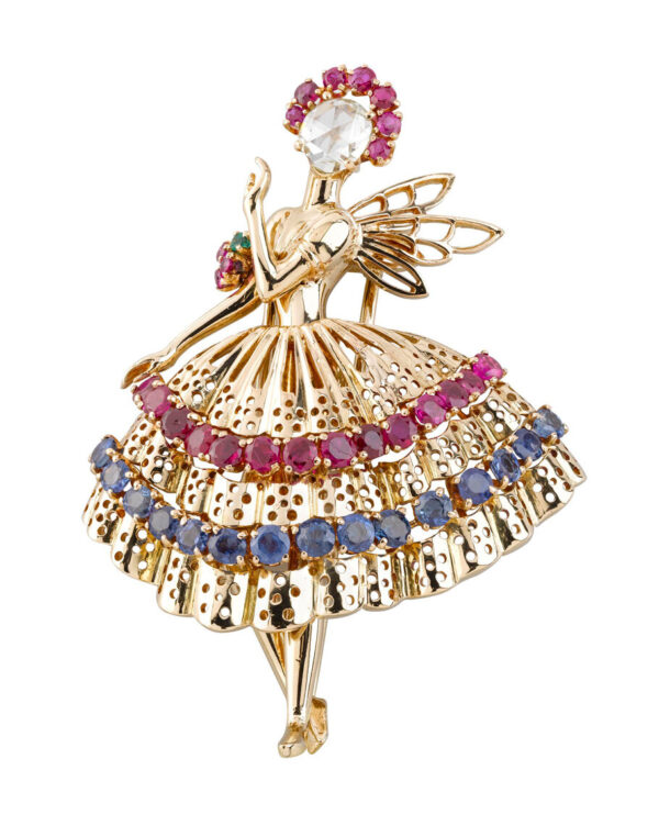Gilded brooch with crystals.
