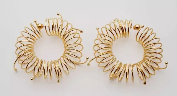 Gold spring earrings.