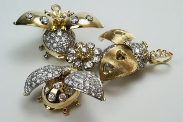 May bugs made of yellow and white gold.