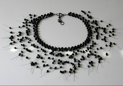 Necklace with black beads.
