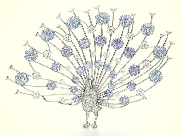 Peacock brooch with transparent rhinestones.