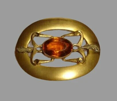 Pin with citrine.