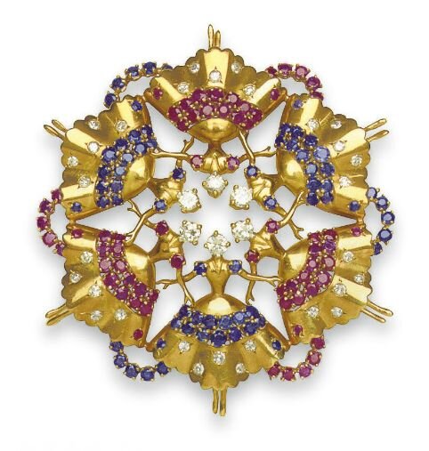 RETRO ROCKETTE BROOCH WITH DIAMONDS, SAPPHIRE AND RUBY.