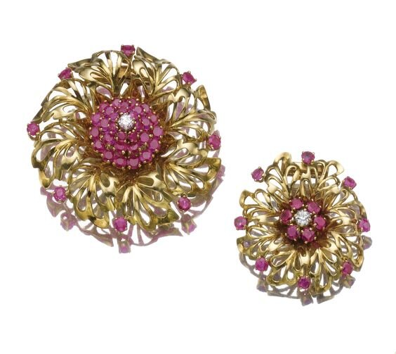 Ruby flower brooch.