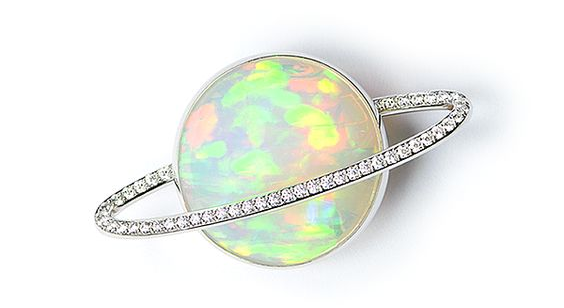 Saturn ring with opal and diamonds.