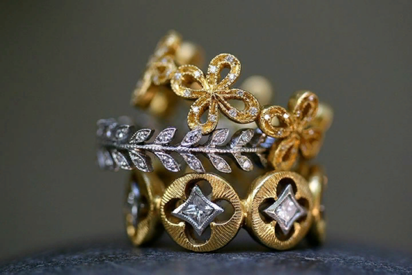 Set of rings with plant motif.