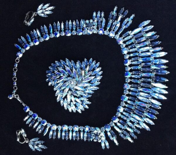 Set with blue rhinestones necklace, earrings and brooch. Set with blue rhinestones necklace, earrings and brooch.