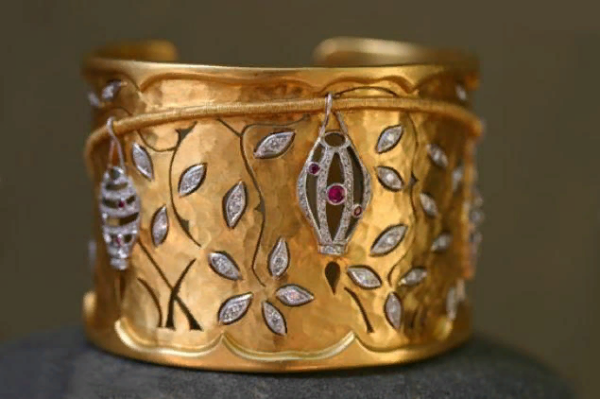 Snow White's mother's bracelet. Hammered gold, platinum, diamonds and rubies amazing beauty.