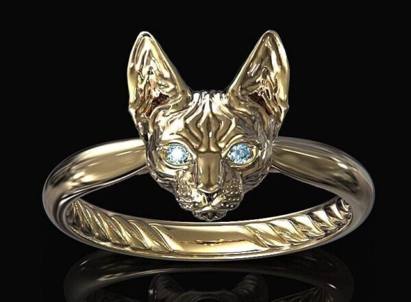 Sphinx ring made of 585 yellow gold with topazes.