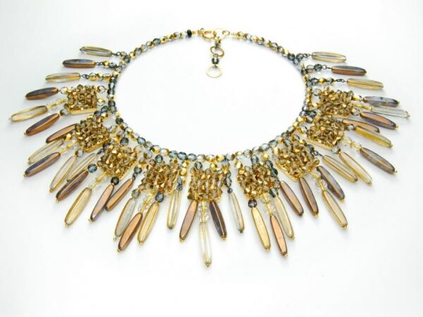 Wide necklace with citrines and mother of pearl.