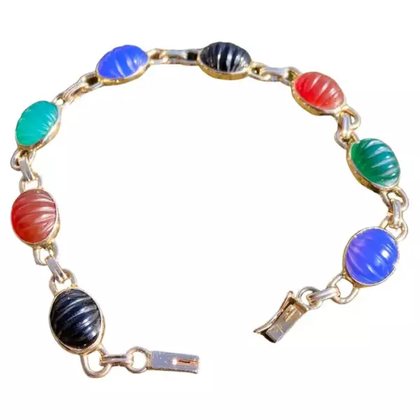 14 Karat Gold Multi Stone Scarab Bracelet. 14 Karat Gold Multi Stone Scarab Bracelet.