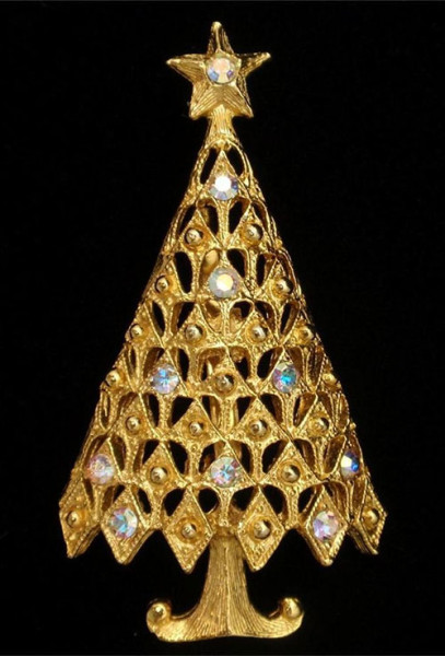 Gilded Christmas tree brooch with a star tip.
